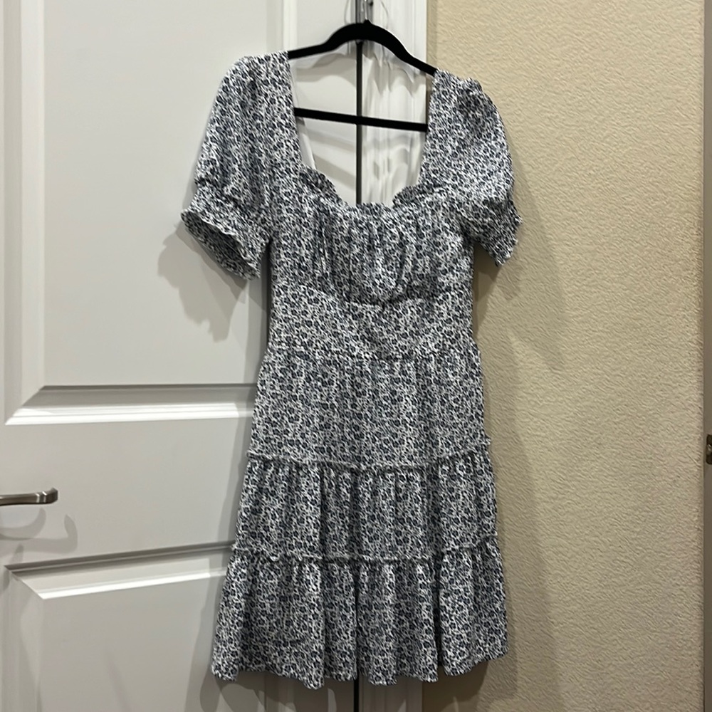 I am selling a very pretty dress from Dillards.